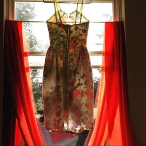 Hand stitched cotton dress lined with the famous Gucci pattern.